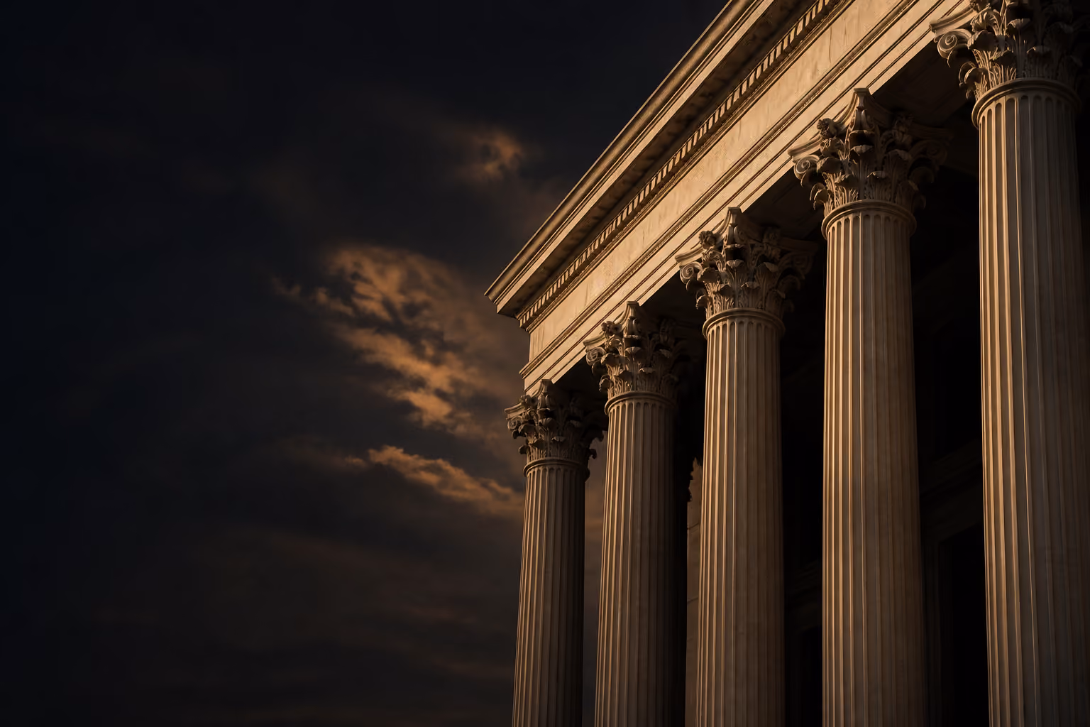 Classical stone columns in warm evening light