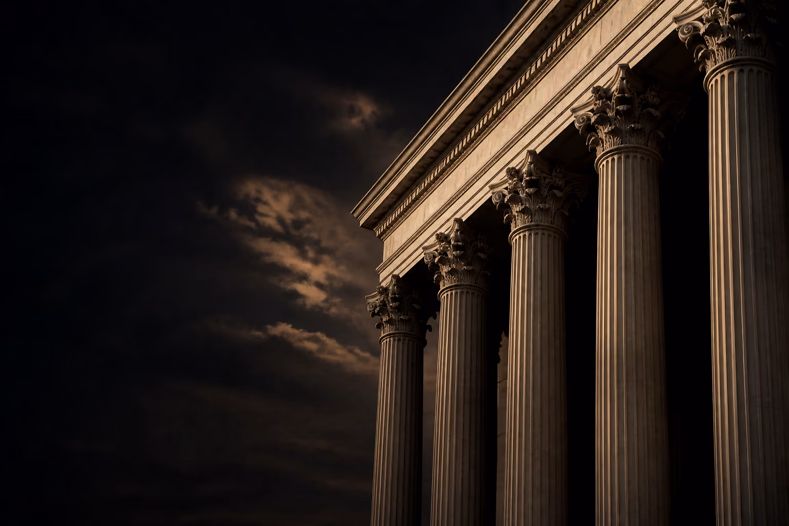Classical stone columns in warm evening light